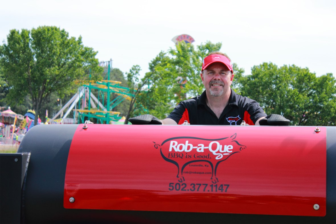 Rob Bailey, Jr. behind his Jambo smoker.